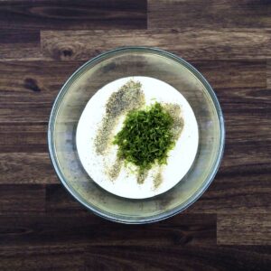 A bowl with mayo and basic seasonings.