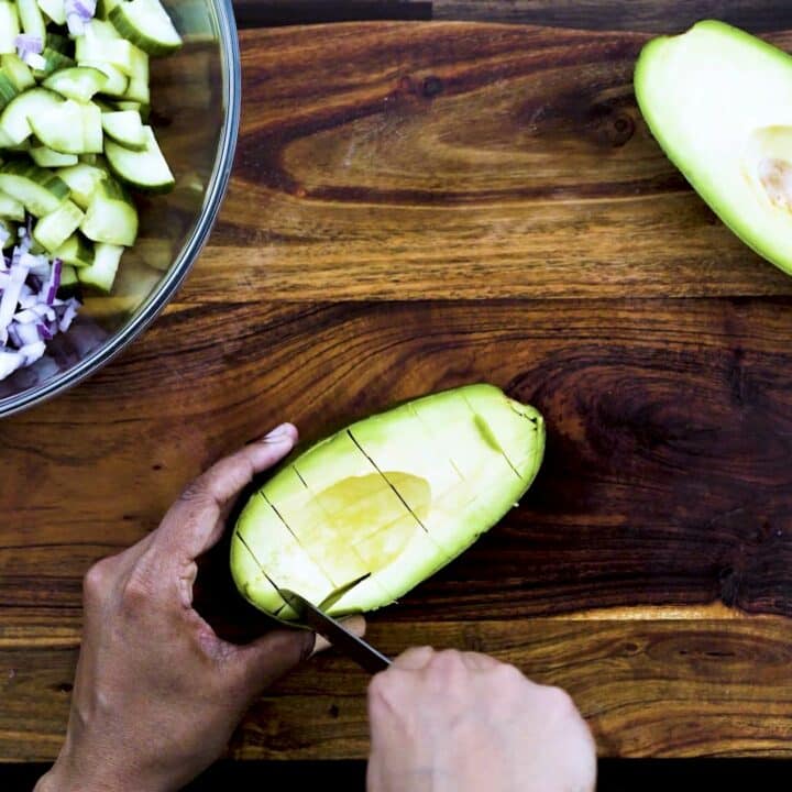 Slicing the avocado.