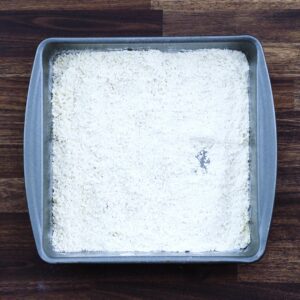A tray with breading mixture.