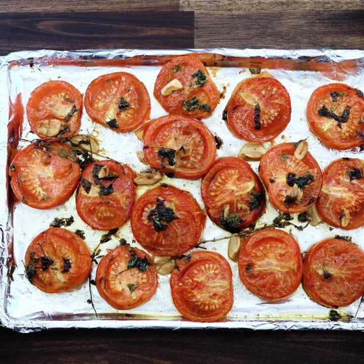 Oven Roasted Tomatoes in baking tray.