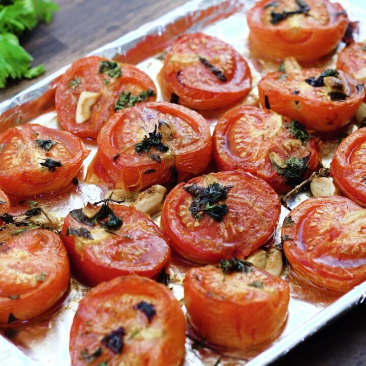 A tray with oven roasted tomatoes.