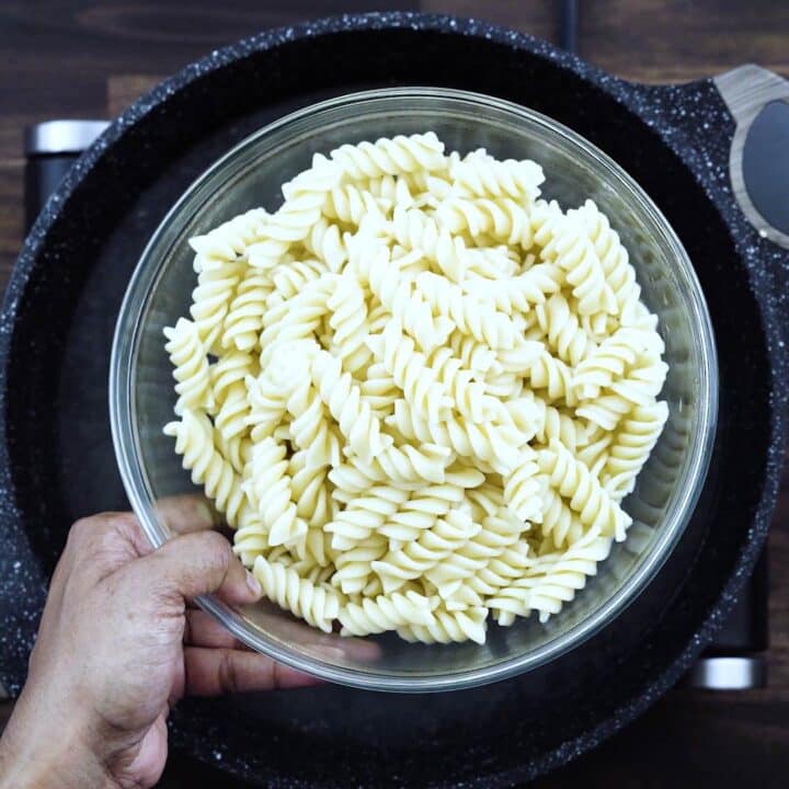 A bowl with cooked pasta.