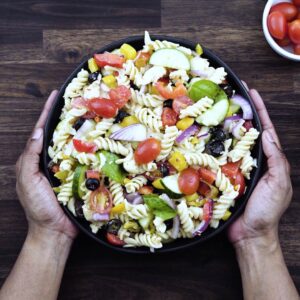Serving Pasta Salad in a serving bowl.
