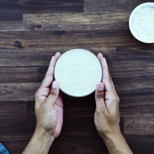Serving Tahini in a small bowl.