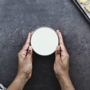 Serving Caesar Salad Dressing in a bowl.