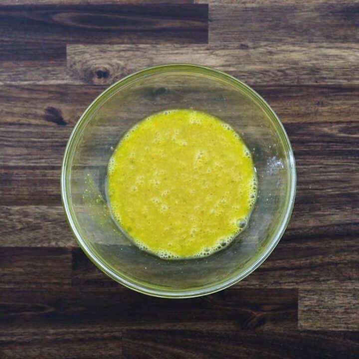 A bowl with egg mixture.