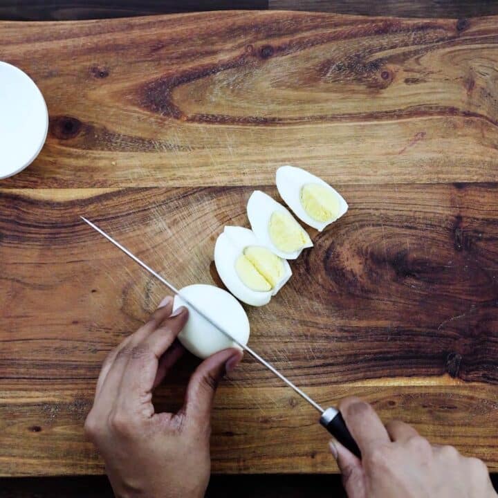 Slicing the boiled eggs.