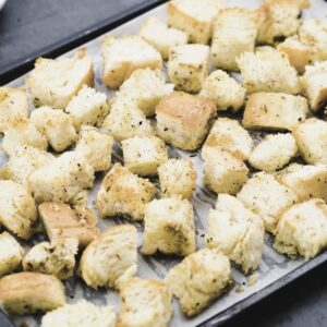 A baking tray with crispy Croutons.