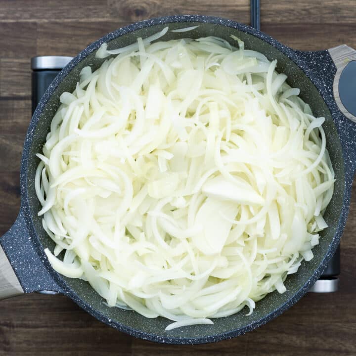 A pan with sauteed soft onions.