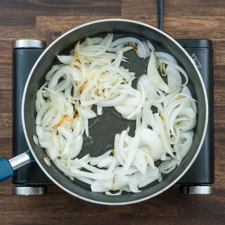A pan with sauteed onions.