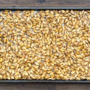 Roasted Pumpkin Seeds on a baking tray.