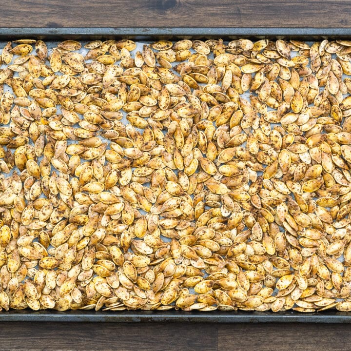 Roasted Pumpkin Seeds on a baking tray.