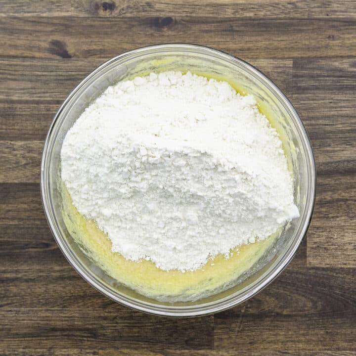 A bowl with the flour mixture added to the egg-butter-sugar mixture.