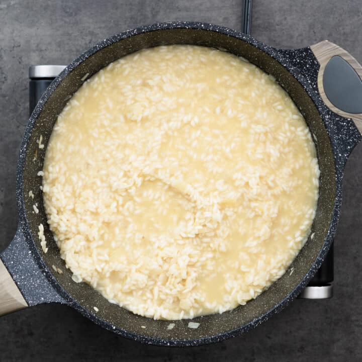 Chicken Broth absorbed rice in the pan.