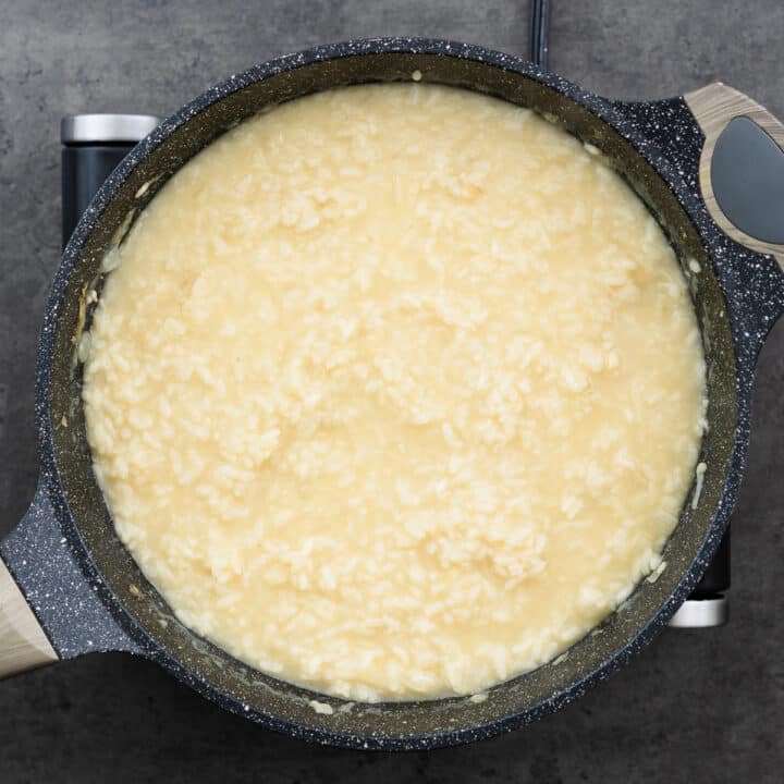 Rice that has been cooked with full usage of broth achieving a creamy texture.