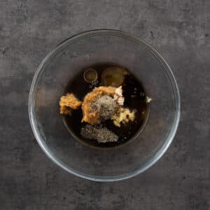 Bowl filled with ingredients for miso marinade.