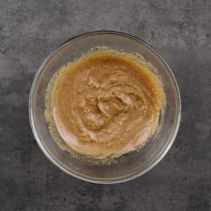 Bowl containing whisked miso marinade.