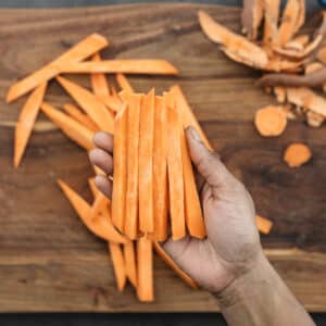 Displaying perfectly sliced fry-shaped sweet potatoes.