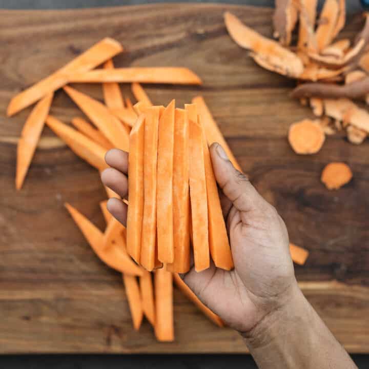Displaying perfectly sliced fry-shaped sweet potatoes.