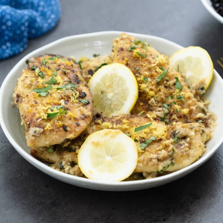 Lemon pepper chicken served in a white bowl.