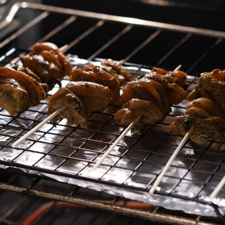 Chicken skewers baking in the oven.