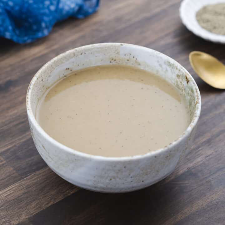 Gravy served in a white bowl, ready to enjoy.