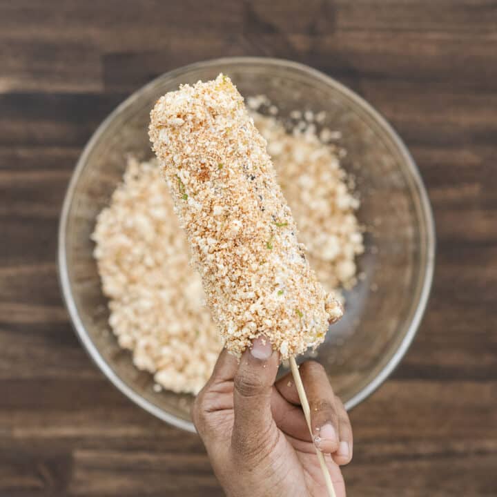 Grilled corn coated with Mexican crema and then generously sprinkled with Cotija cheese.