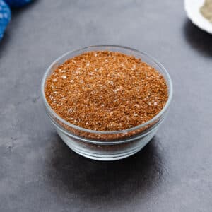 Dry rub for ribs served in a glass bowl.
