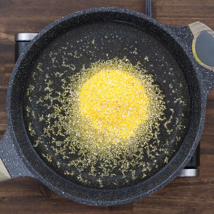 A pan with water and polenta.