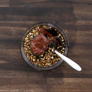 A bowl with sesame sauce.