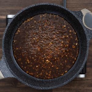 A pan with sesame sauce simmering.