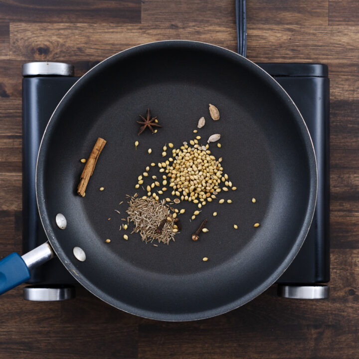 Pan with dry spices ready for toasting.