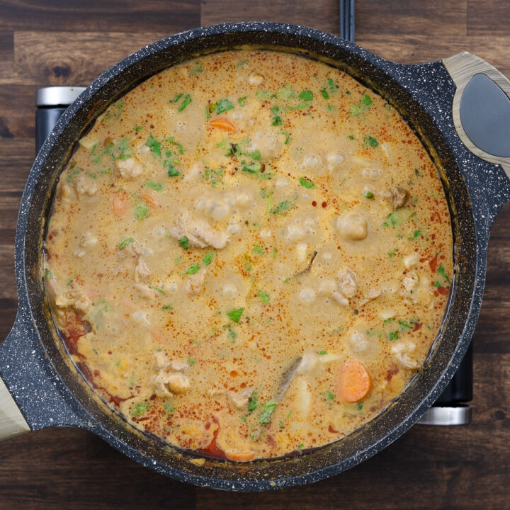 Thai Massaman curry garnished with cilantro.